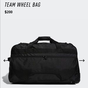 Rolling duffel travel bag with wheels.